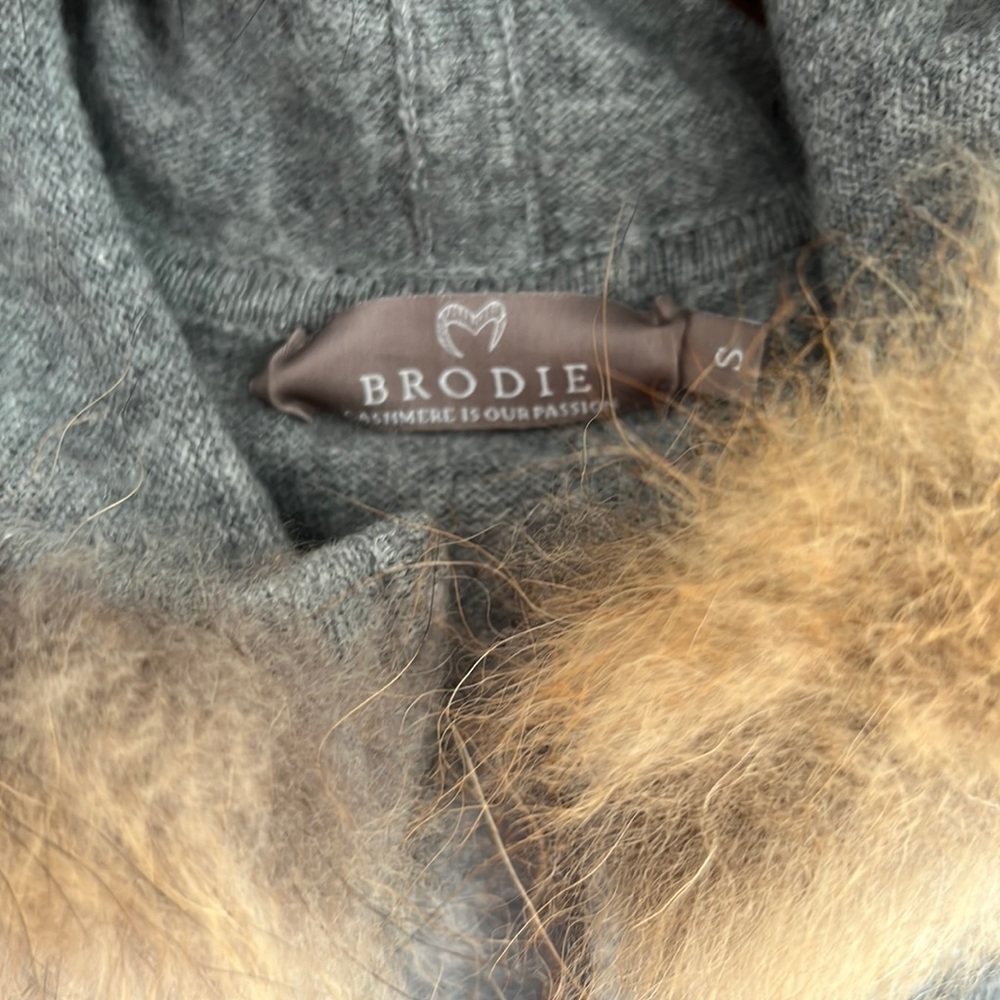 BRODIE Cashmere sweater with fox fur around the hood.